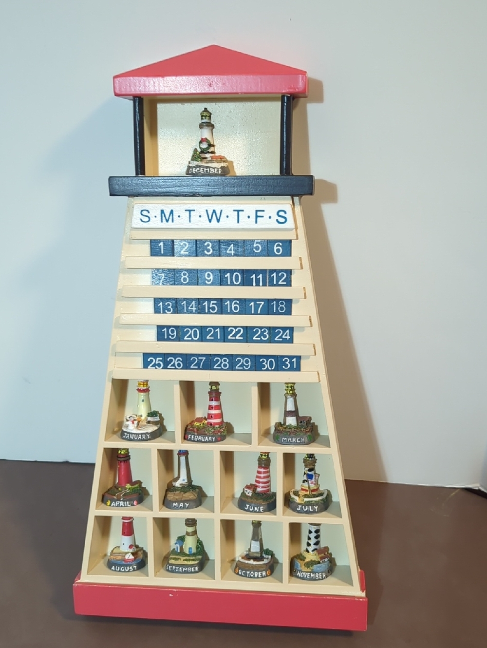Lighthouse Perpetual Calendar With Wall Shelf With 12 Ceramic Light Houses 1-31